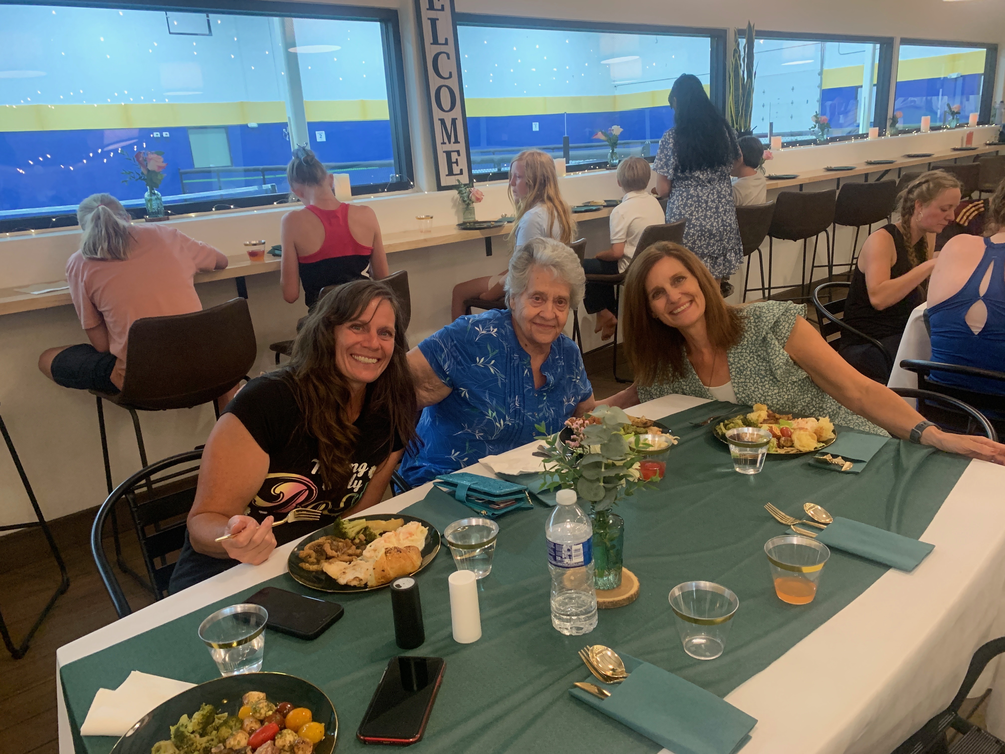 Guests enjoying food during a Springs Pickleball event