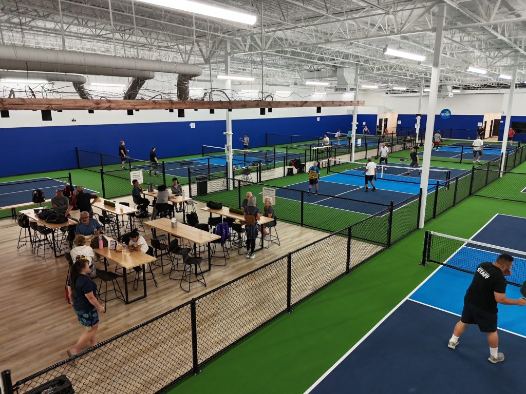 Springs Pickleball East courts and player lounge